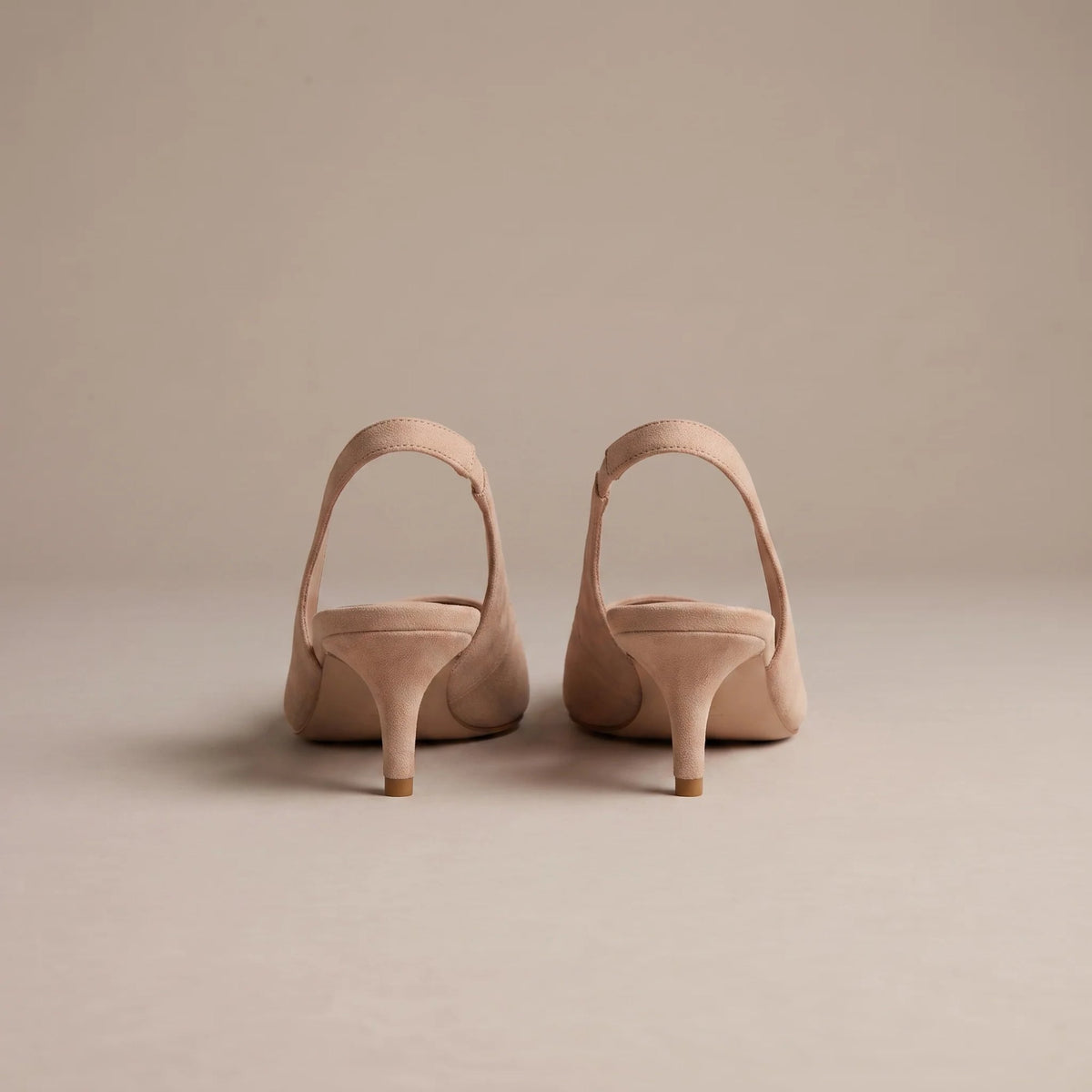 Nude kitten heel slingback shoes, back view