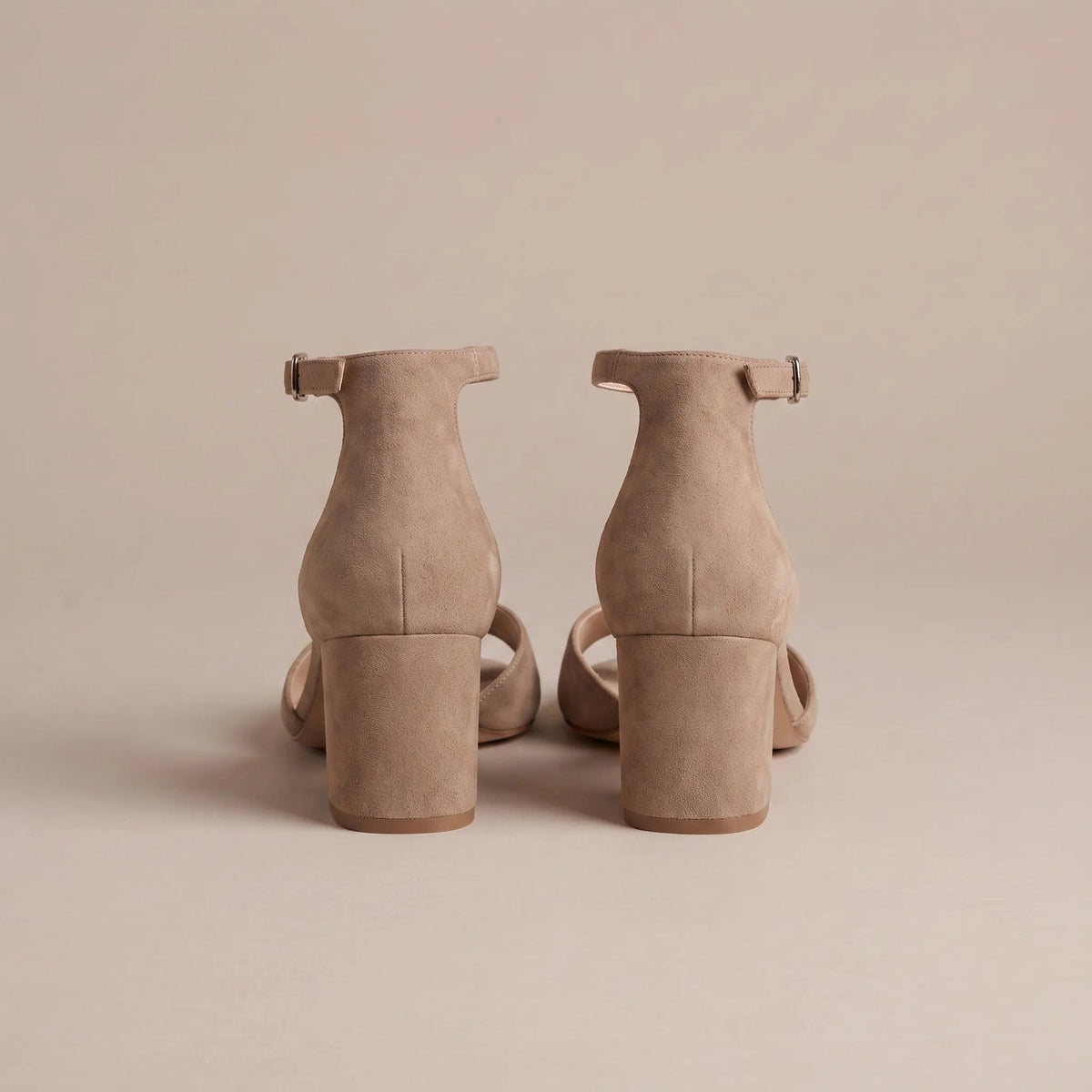 Taupe ankle strap block heel sandals, back view