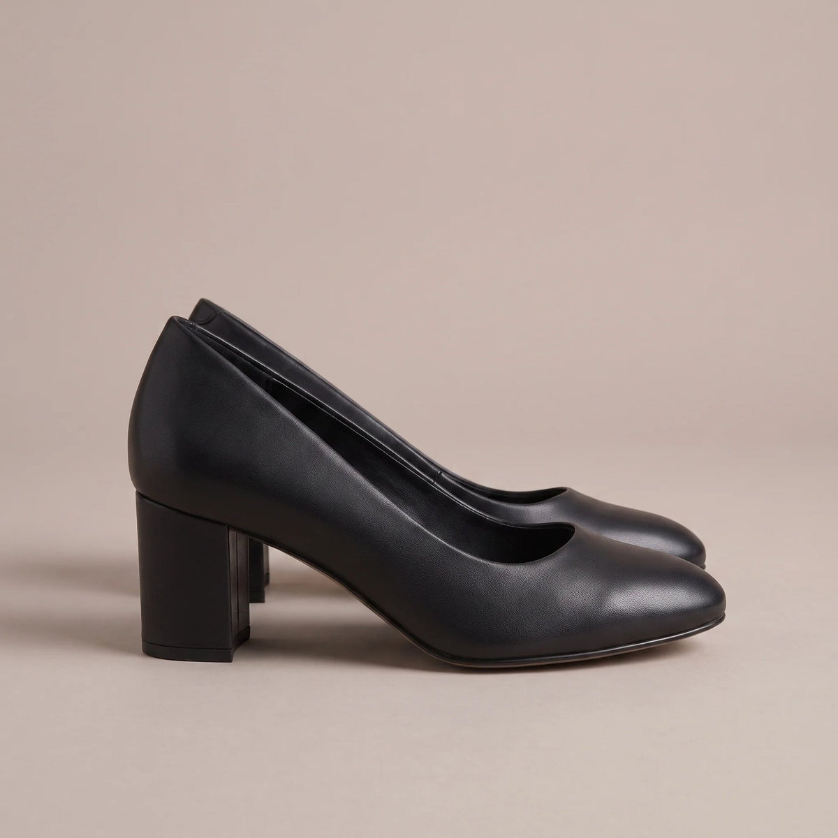 Black block heel court shoes, side view