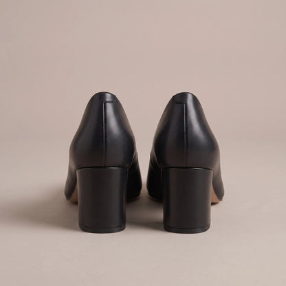 Black block heel court shoes, back view