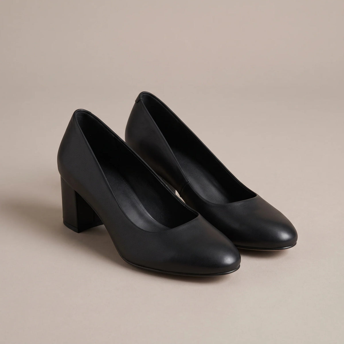 Black block heel court shoes, front view