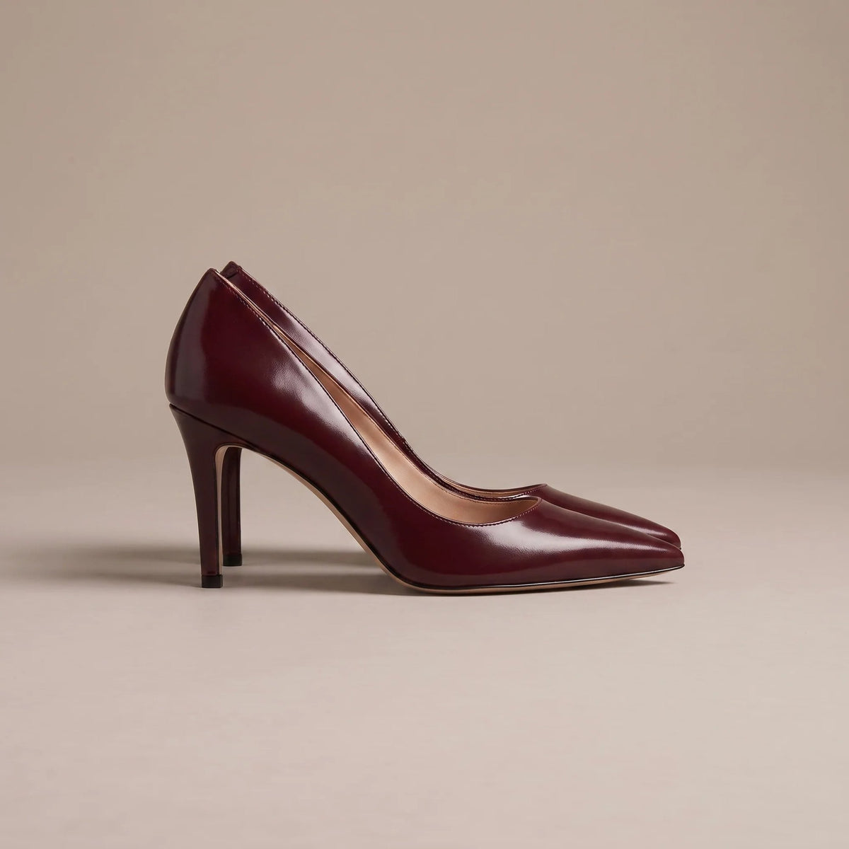 Burgundy pointed toe stiletto court shoes, side view